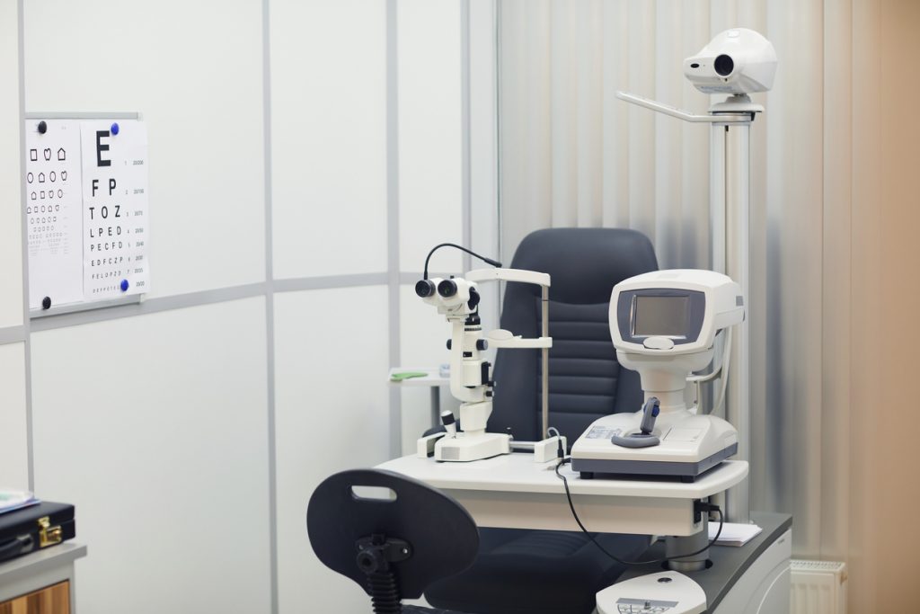 Chair at optometry center with equipment